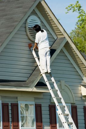 Exterior Painting being performed by an experienced Dominion Painting painter.